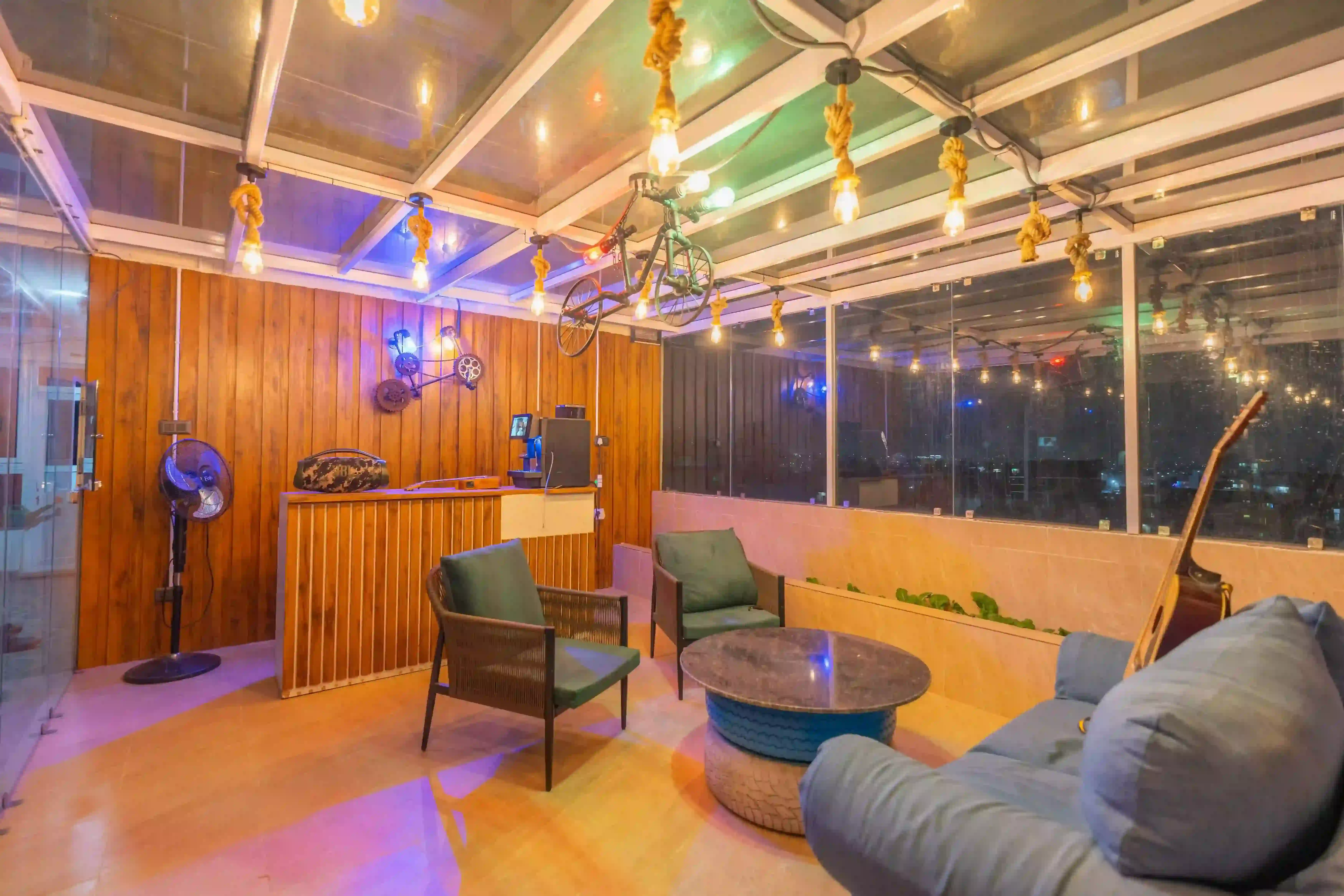 Rooftop lounge at Aananda Homestay with panoramic views